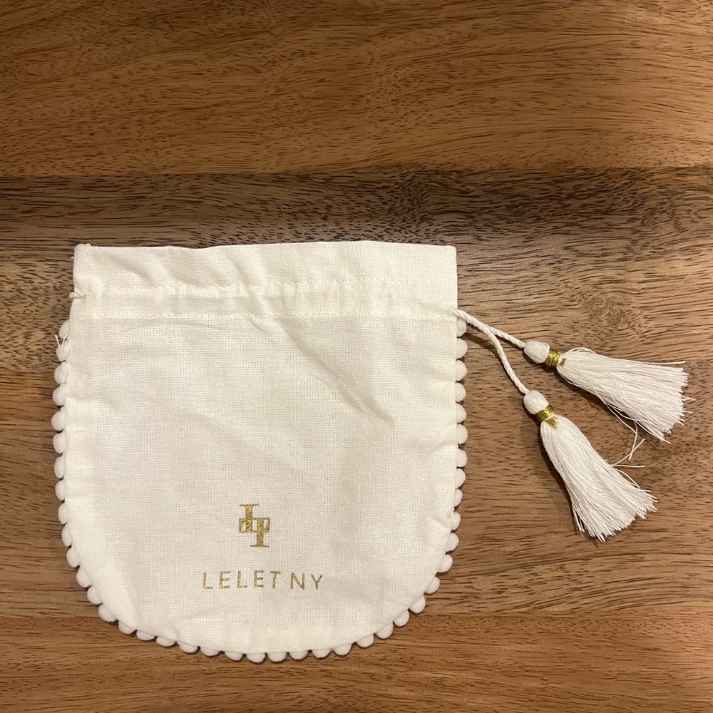 Lelet NY White Pom Tassel Dust Bag / Jewelry Pouch